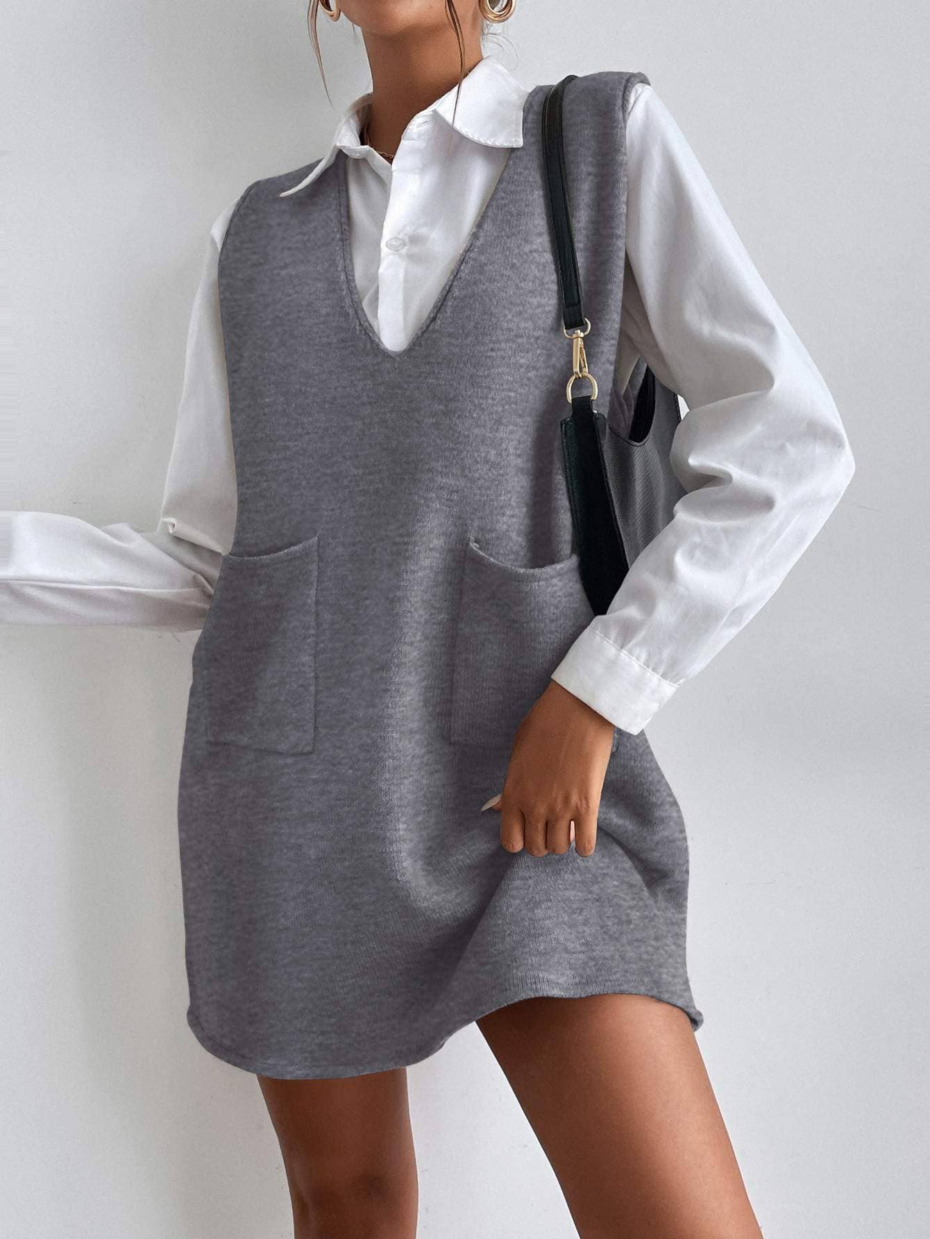 Dual pocket sleeveless sweater dress